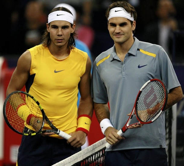 Switzerland's world number one tennis player Roger Federer (R) and Spain's Rafael Nadal (L) pose for a photo before their semi-final match, 18 November 2006, at the Tennis Masters Cup in Shanghai.  Federer defeated Nadal 6-4, 7-5.  AFP PHOTO/Frederic J. BROWN (Photo credit should read FREDERIC J. BROWN/AFP/Getty Images)